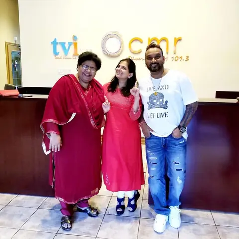 Swati with two guests at the TVI and CMR reception
