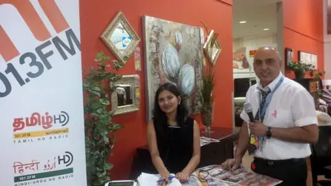 Swati with guests at a CMR 101.3 FM live booth