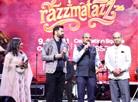 RJ Swati on stage with a microphone at Canada Diwali RazzMatazz 2026 in Mississauga